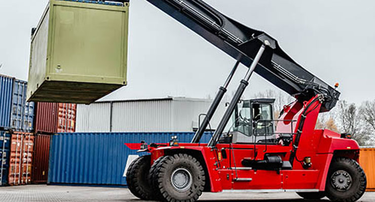 HOW ARE SHIPPING CONTAINERS LOADED ONTO A TRAILER?